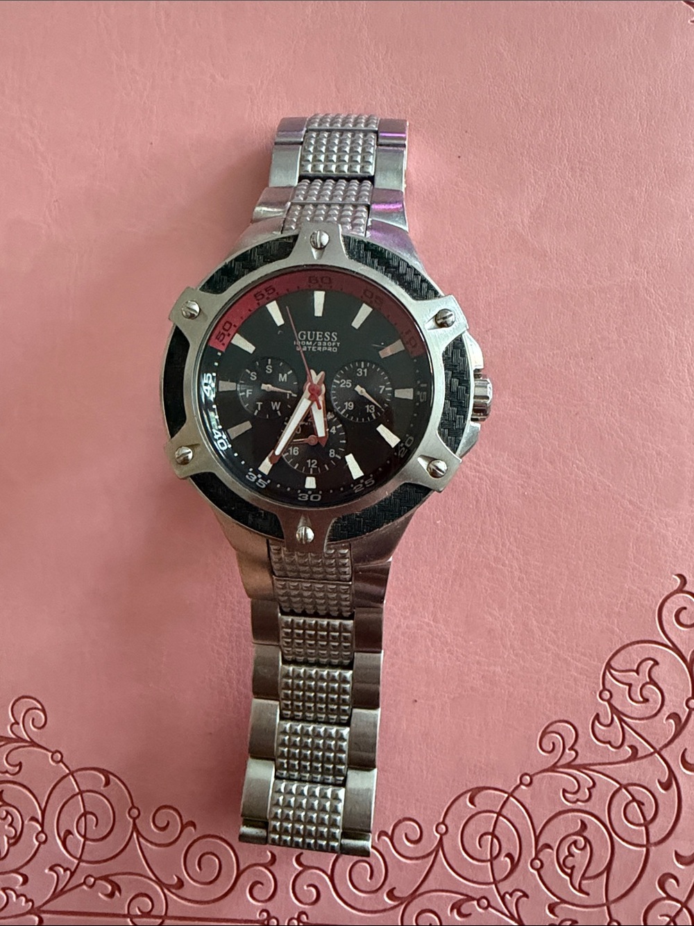 Watch on pink background